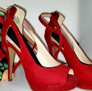 Nine West, suede ankle strap platform heels.